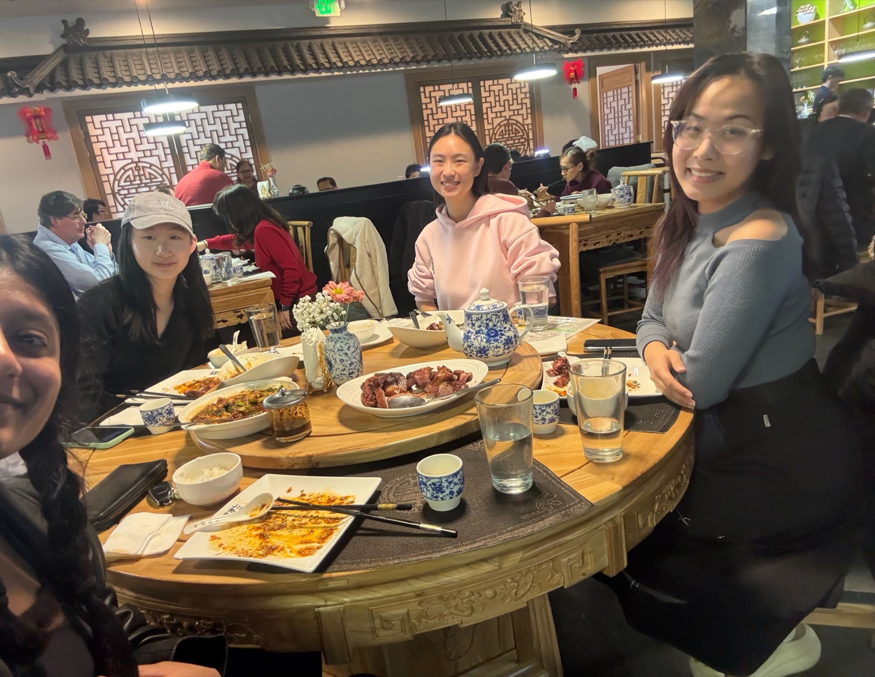 Lab members sitting together at a restaurant.